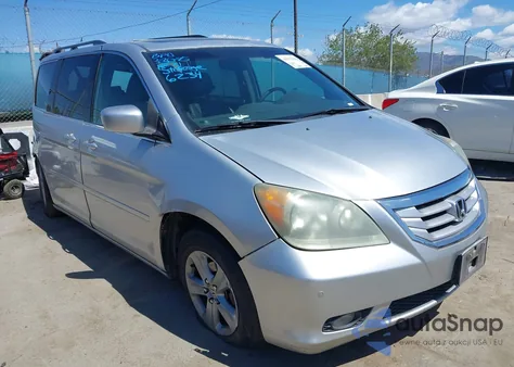 2010 Honda Odyssey Touring from USA, damaged, VIN 5FNRL3H99AB056234